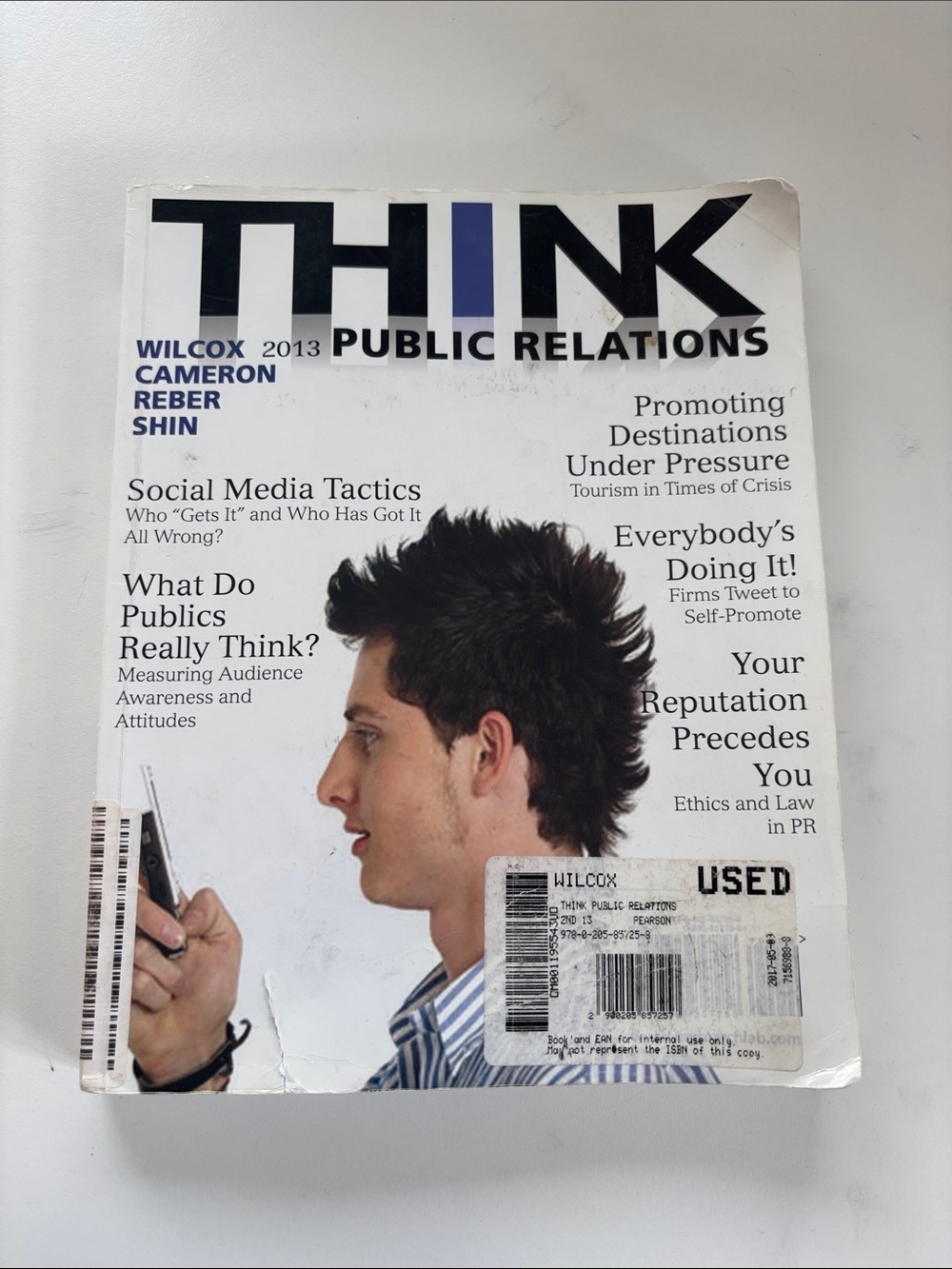 Pearson THINK Public Relations Book with Black and Blue Accents
